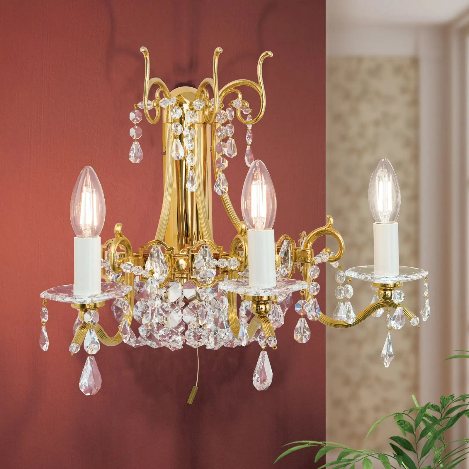 Zidna lampa NAGOYA, sa tri izvora svetla, pozlaćena