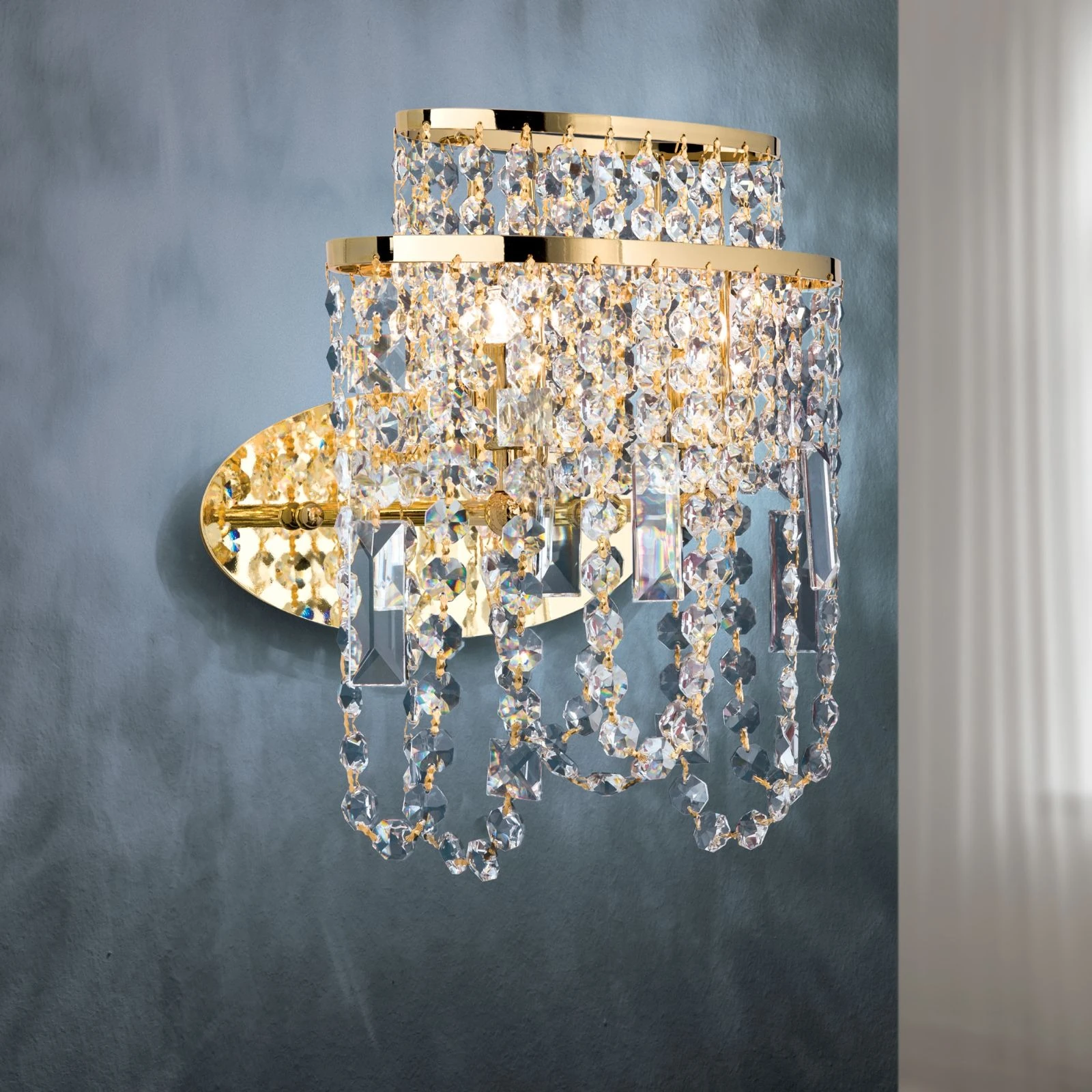 Zidna lampa KRISTALLDESIGN, pozlaćena 24-karatnim zlatom