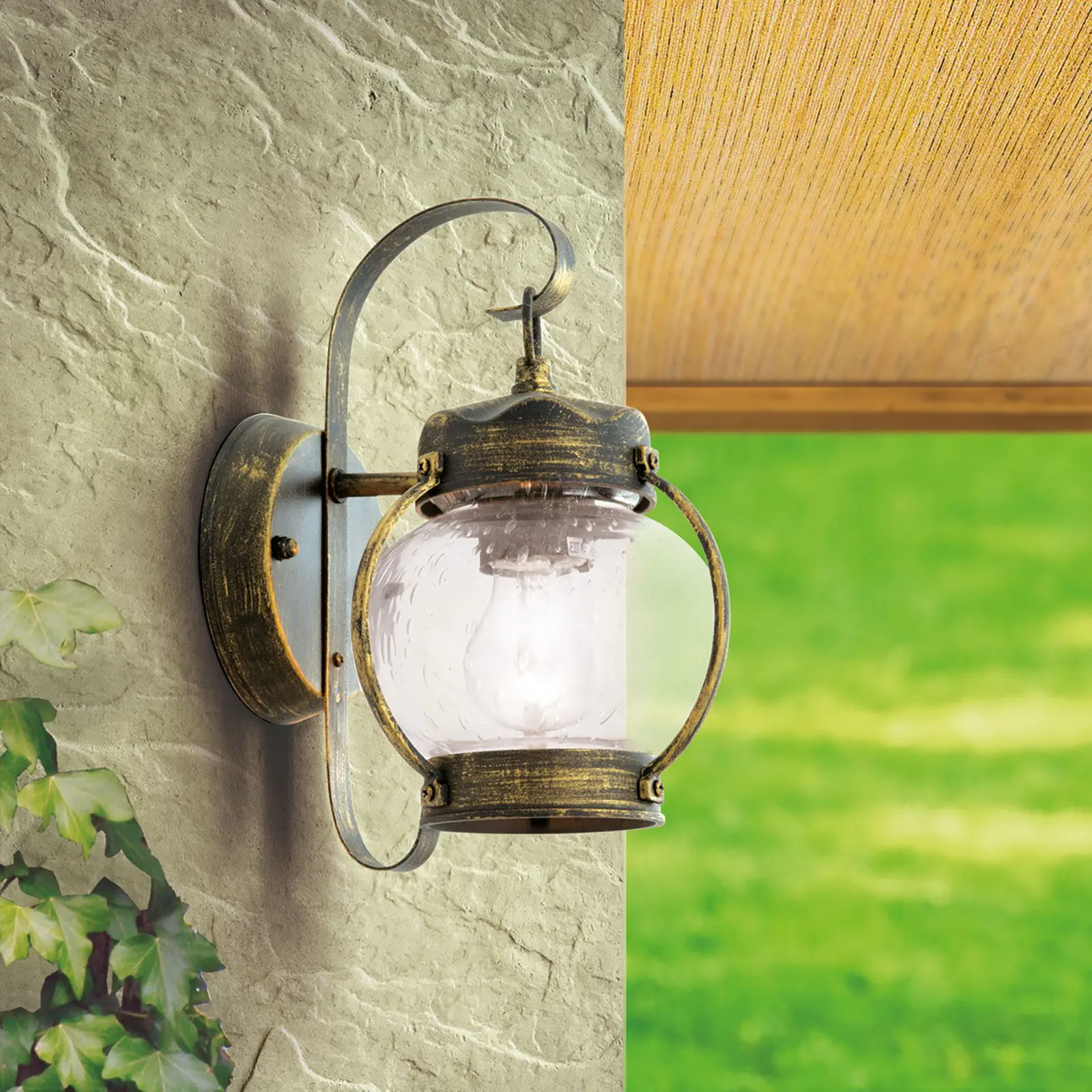 Spoljašnja zidna lampa TAVERNA, crno-zlatna, okrugla